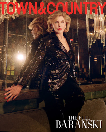 Christine Baranski poses in a black sequin suit on the cover of Town & Country magazine. Her reflection is visible in the mirror.