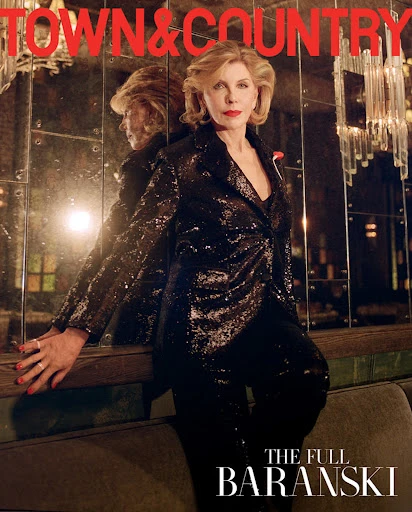 Christine Baranski poses in a black sequin suit on the cover of Town & Country magazine. Her reflection is visible in the mirror.