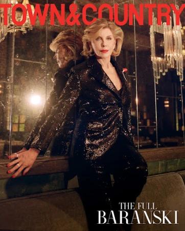 Christine Baranski poses in a black sequin suit on the cover of Town & Country magazine. Her reflection is visible in the mirror.