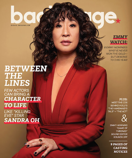 Magazine cover featuring actress Sandra Oh wearing a red suit, with the magazine title 'Backstage' visible in the upper left corner.