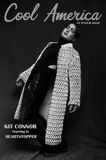 Magazine cover in black and white featuring Kit Connor in a crocheted jacket, black top and pants, with 'Cool America Summer 2022' text.