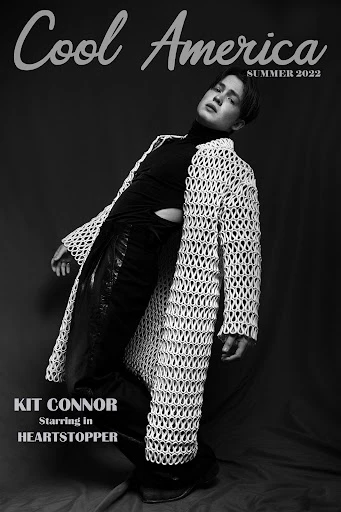 Magazine cover in black and white featuring Kit Connor in a crocheted jacket, black top and pants, with 'Cool America Summer 2022' text.