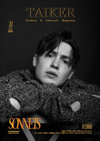 Magazine cover featuring a young adult with dark hair, wearing a distressed sweater, set against a dark backdrop and graphic text.