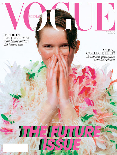 Vogue Nederland magazine cover featuring a person with hands covering their face, wearing a floral and feathery couture outfit. The Future Issue.