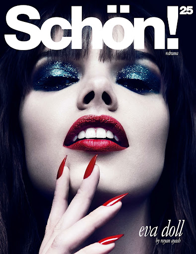 Close-up portrait of a woman with striking red lips, glittery eyeshadow, and red manicure, featured on the cover of Schön! magazine.