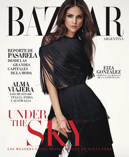 Magazine cover featuring Eiza Gonzalez in black dress and boots, Harper's Bazaar Argentina, fashion, beauty, and entertainment, studio shot.