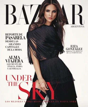 Magazine cover featuring Eiza Gonzalez in black dress and boots, Harper's Bazaar Argentina, fashion, beauty, and entertainment, studio shot.