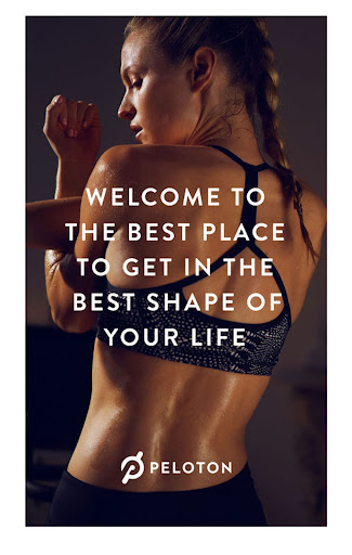Athletic woman in sports bra stretches arms in fitness studio, promoting health and wellness with Peloton fitness equipment and lifestyle.