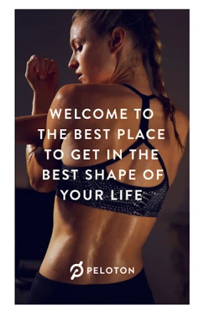 Athletic woman in sports bra stretches arms in fitness studio, promoting health and wellness with Peloton fitness equipment and lifestyle.
