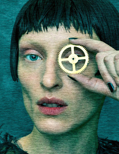 Conceptual beauty portrait of a woman holding a gold gear over one eye, showcasing stylized makeup and a short, dark hairstyle.