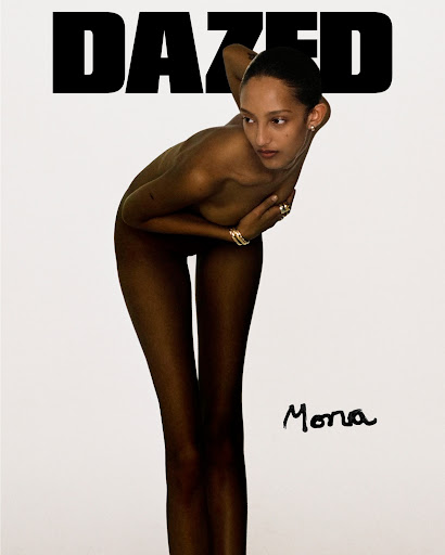 Magazine cover featuring a slender woman with dark skin and slicked-back hair, striking a pose against a clean white backdrop.