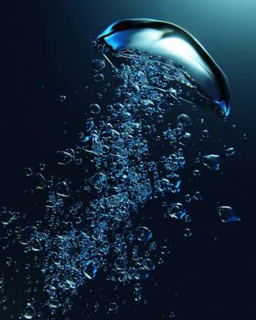 Close-up studio shot of numerous translucent blue bubbles rising against a dark blue gradient background, creating an abstract underwater effect.