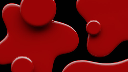 Abstract 3D rendering on black background featuring fluid-like shapes and spheres in shades of vibrant red, smooth textures, and glossy finish.
