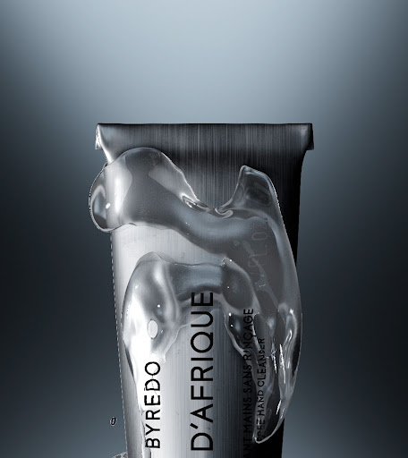 BYREDO D'Afrique rinse-free hand cleanser tube with transparent gel. Still life product shot on a gray gradient background.