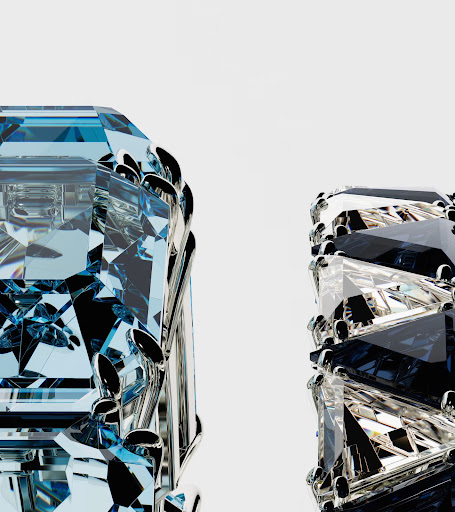 Geometric abstract featuring two stylized diamond-like objects in a surreal composition against a plain white backdrop with cool color palette.