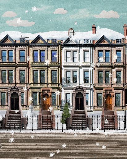 Row of brownstone buildings with snow-covered roofs on a winter day. Falling snowflakes in the foreground add a seasonal touch.