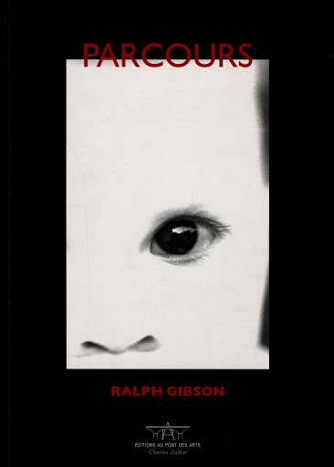 Black and white book cover featuring a close-up partial image of a child's face and eye, with title and author text.