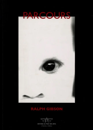 Black and white book cover featuring a close-up partial image of a child's face and eye, with title and author text.