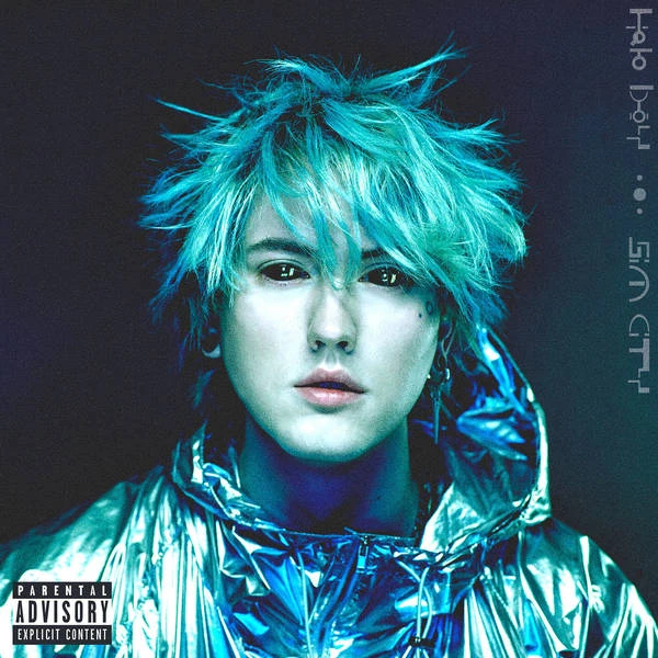 Close-up of a person with blue spiky hair wearing a blue metallic jacket in front of a dark background, with music album art.