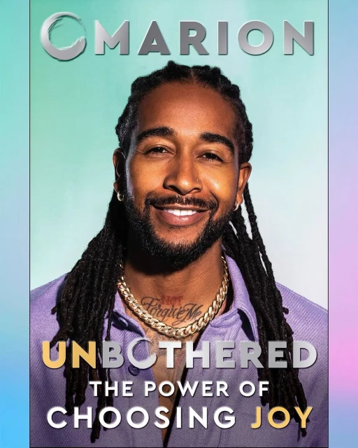 Magazine cover featuring smiling Black man with dreadlocks wearing gold chain and purple shirt, text "Unbothered the power of choosing joy".