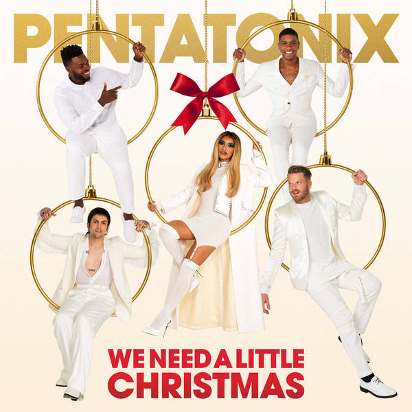 Five members of Pentatonix wearing white outfits posed inside golden ornament hoops hanging against a seamless white background.