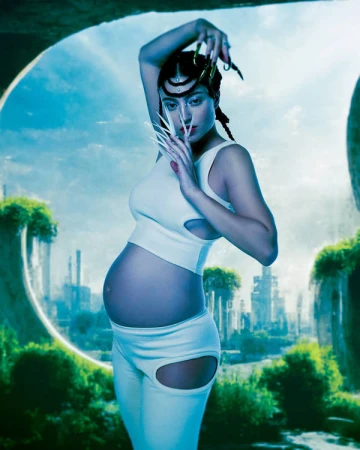 A pregnant woman with long nails poses in front of a futuristic landscape in a fashion editorial photograph with a science-fiction aesthetic.