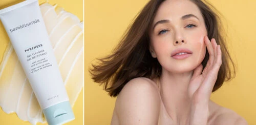 Close-up shot of a woman with bareMinerals skincare product on a yellow backdrop, emphasizing beauty and skincare.