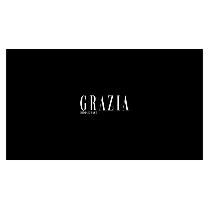 White Grazia Middle East magazine logo centered on a solid black background.