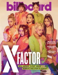 Seven young female members of the group XG pose together for a vibrant magazine cover styled with colorful outfits and elaborate hairstyles.