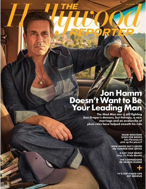 Magazine cover featuring Jon Hamm in a denim jacket sitting in a car, with a stack of cassettes and a baseball cap on the seat.