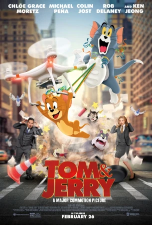 Movie poster for "Tom & Jerry" film featuring the animated characters Tom and Jerry causing chaos in a city, with live-action actors.