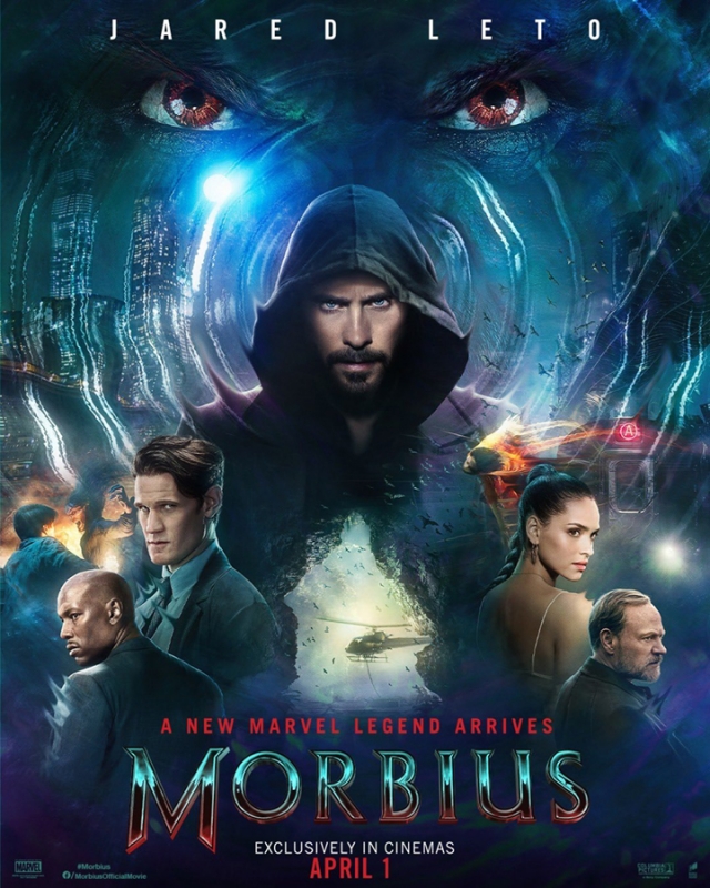 Movie poster for Morbius featuring Jared Leto, Matt Smith, and Adria Arjona, with a dark urban backdrop, advertising the film's theatrical release.