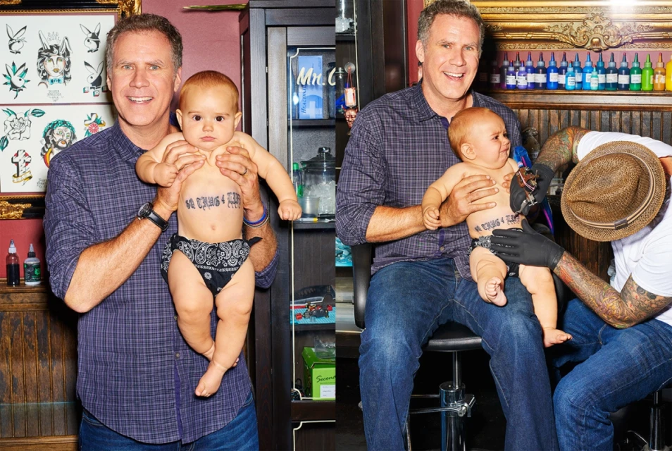 Actor Will Ferrell holding a baby with fake chest tattoo, seated in tattoo parlor while tattoo artist adds to the fake tattoo.