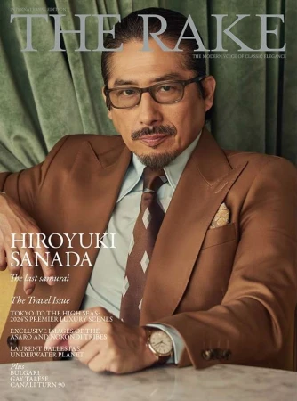 Magazine cover featuring Hiroyuki Sanada in a brown suit and tie. The cover of The Rake displays text, including 'The Travel Issue'.