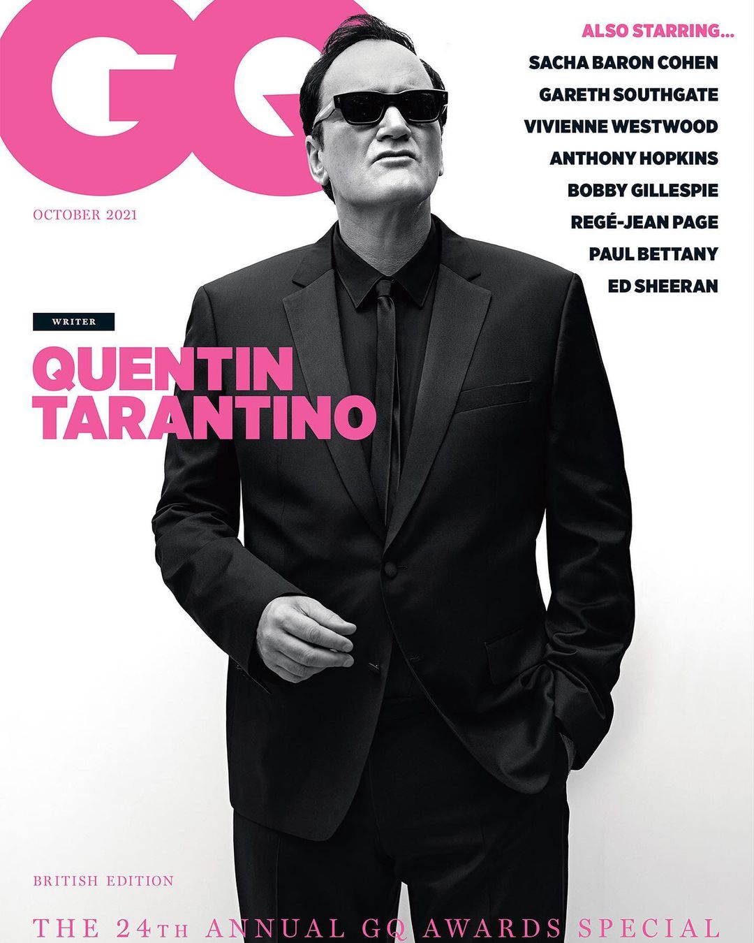 Portrait of Quentin Tarantino in a black suit and sunglasses on a magazine cover shot by Eric Ray Davidson.