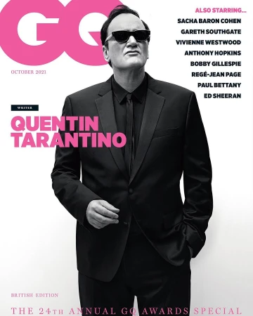 Portrait of Quentin Tarantino in a black suit and sunglasses on a magazine cover shot by Eric Ray Davidson.