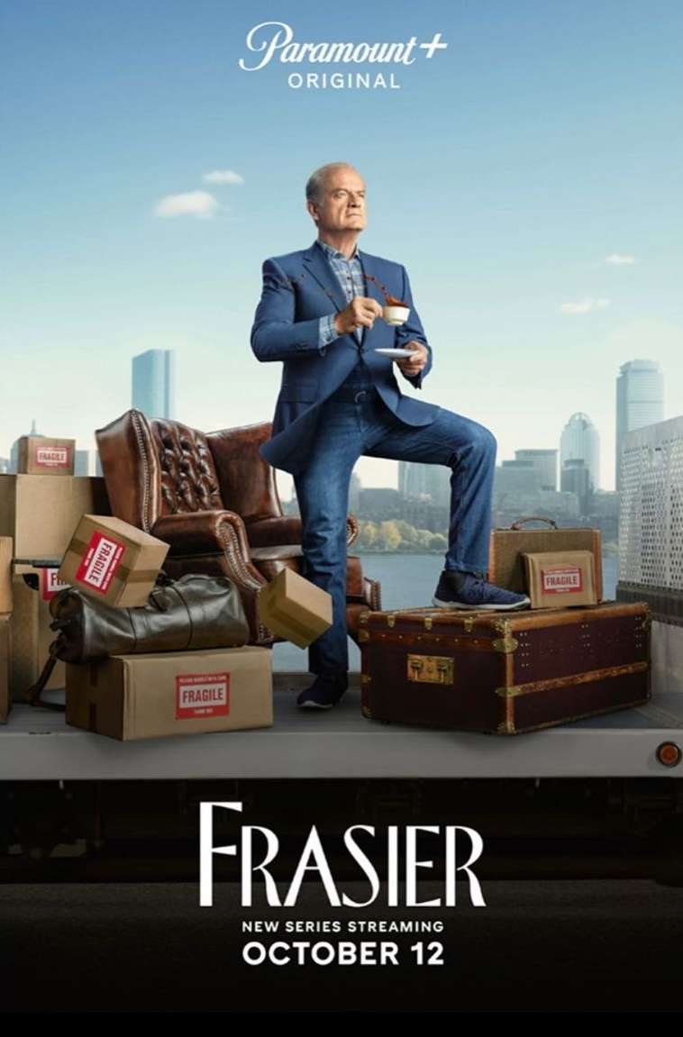 Poster image for Frasier revival: Kelsey Grammer in blue suit with coffee cup, seated on moving boxes, set against city skyline.