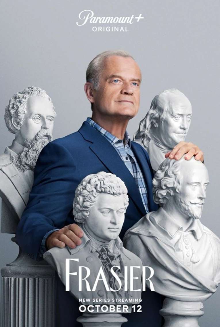 Kelsey Grammer poses with classical sculpture busts for 'Frasier' revival on Paramount+, airing in October. Medium shot, eye-level.