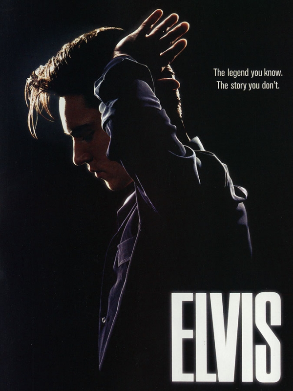 Movie poster featuring a profile of a man with slicked-back hair in a dark coat, dramatically lit against a dark background, and the word ELVIS.