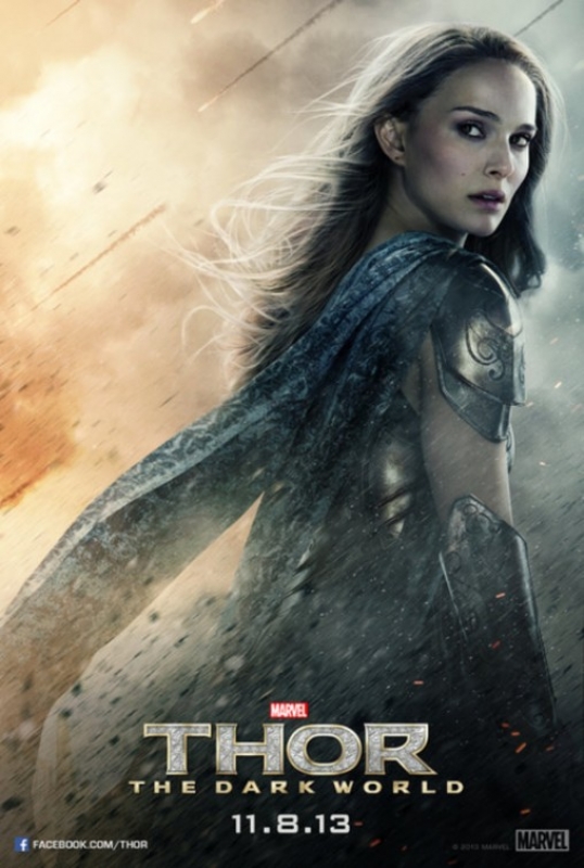 Publicity image for the film Thor: The Dark World features Natalie Portman in costume against a smoky orange and grey background.
