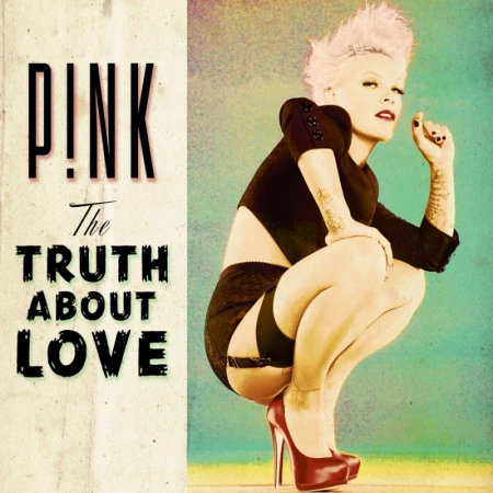 Pink crouching in a black top, garters, and red high heels against a textured background with overlaid typography