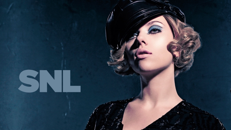 Scarlett Johansson wearing a leather cap and blue eyeshadow in a portrait by photographer Mary Ellen Matthews.