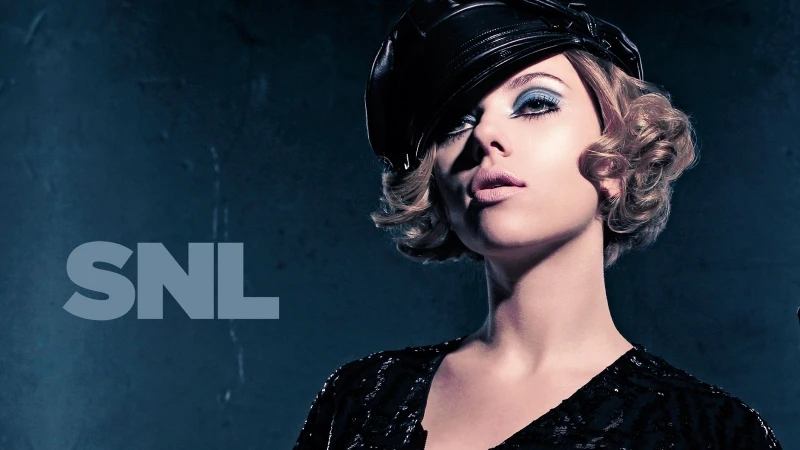Scarlett Johansson wearing a leather cap and blue eyeshadow in a portrait by photographer Mary Ellen Matthews.