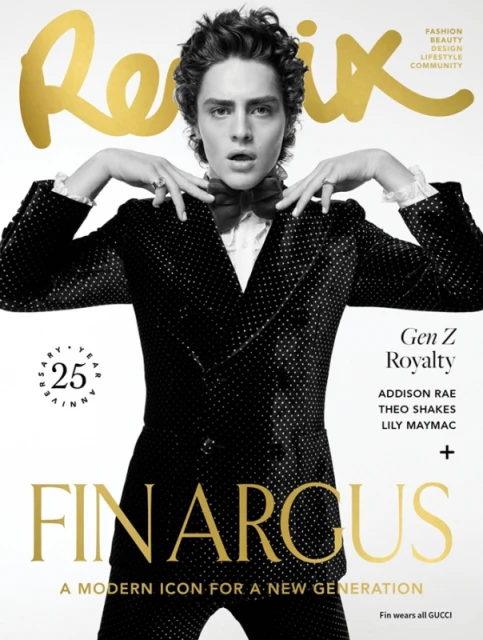 Magazine cover featuring a young adult male model with dark hair wearing a polka-dot tuxedo and bow tie on a white background.