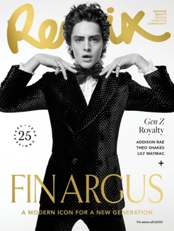 Magazine cover featuring a young adult male model with dark hair wearing a polka-dot tuxedo and bow tie on a white background.