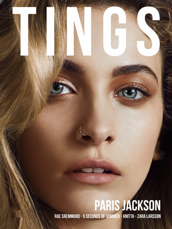 Close-up portrait of Paris Jackson with blonde hair, blue eyes, and a nose ring, featuring bold magazine cover typography.