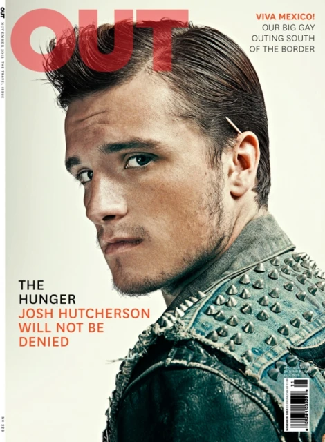 Josh Hutcherson poses on the cover of Out Magazine wearing a studded jacket against a light background in a close-up studio shot.