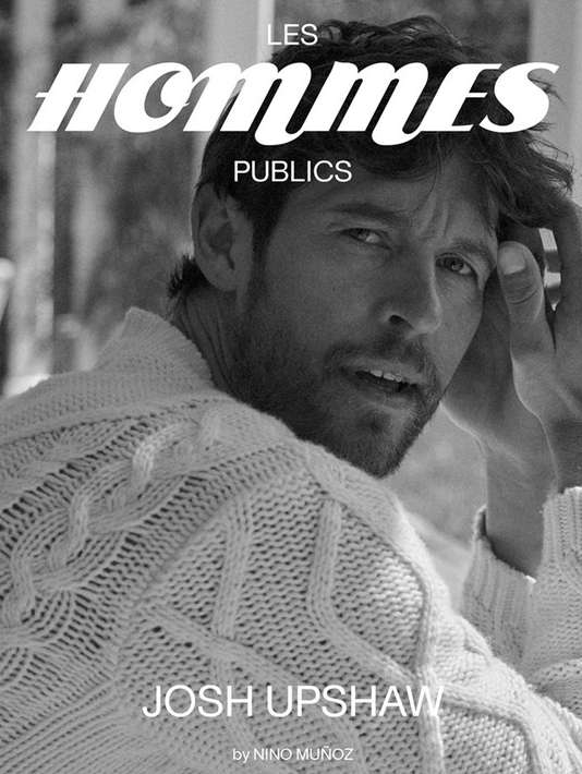 Black and white portrait of Josh Upshaw wearing a cable-knit sweater. The magazine cover features stylized text and the photographer's credit.