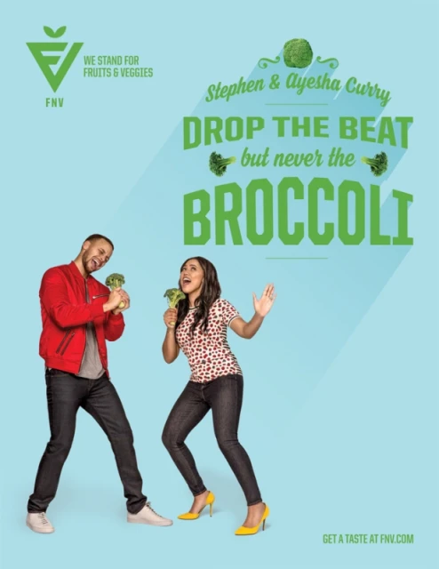 Stephen and Ayesha Curry in a light blue background advertisement for FNV holding broccoli like microphones and singing.