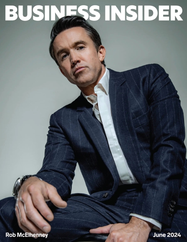 Business Insider cover featuring Rob McElhenney in a blue pinstripe suit, posing in a photo studio setting, looking at the camera.